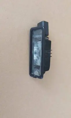 Volkswagen Golf VI Number plate light 1K8943021