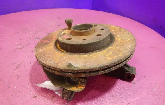 Front wheel hub spindle knuckle