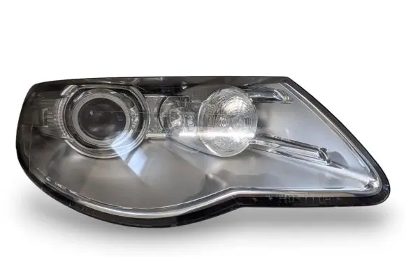 Volkswagen Touareg I Headlight/headlamp 7L6941032C 1ZS00945202