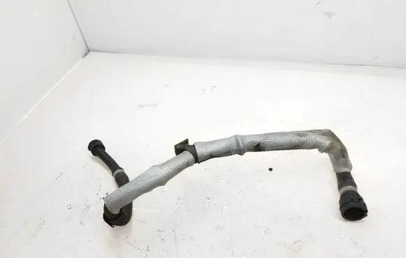 Volkswagen Touareg II Engine coolant pipe/hose 7P6122109