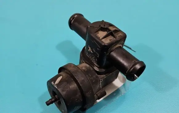 Coolant heater control valve