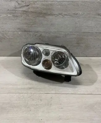 Volkswagen Touran I Headlight/headlamp 0301205602 1T0941006G