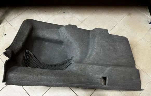 Trunk/boot lower side trim panel
