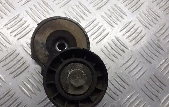 Opel Zafira B Alternator belt tensioner pulley 