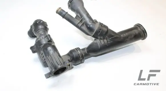 Volkswagen PASSAT CC Thermostat housing 04L121026Q