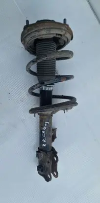 KIA Carens II Front shock absorber with coil spring