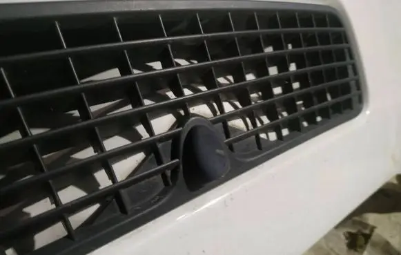 Windshield washer spray nozzle