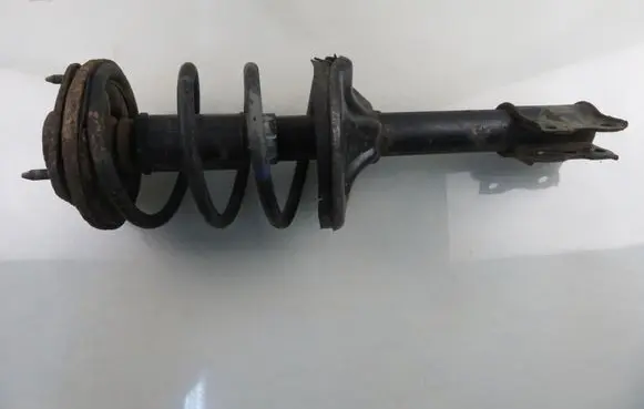 Front shock absorber with coil spring