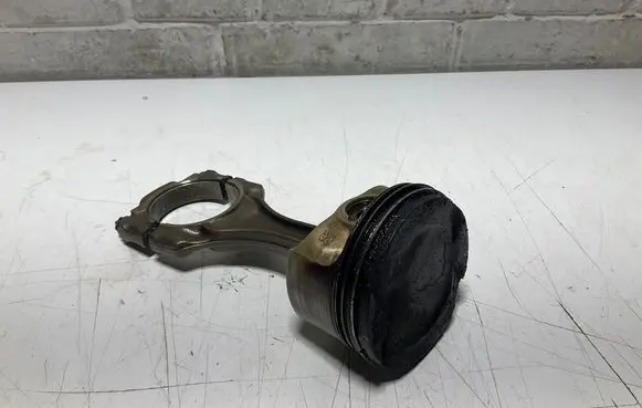 Piston with connecting rod