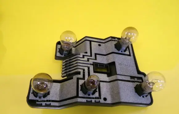 Opel Astra F Tail light bulb cover holder 394449 394443