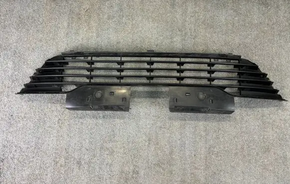 Citroen C4 I Front bumper lower grill 9646215877 K3049
