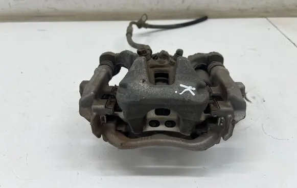 Toyota Yaris XP210 Rear brake caliper F394