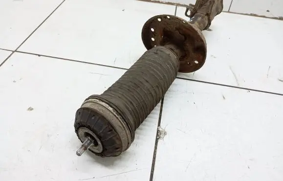 Opel Corsa D Front shock absorber/damper 13214360
