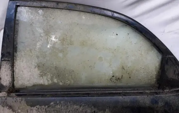Mazda 323 Rear door window glass