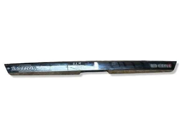 Opel Astra H Trunk door license plate light bar 13266475