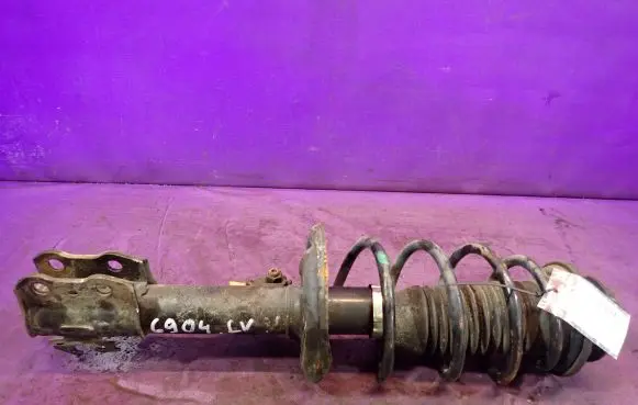 Toyota Yaris Front shock absorber with coil spring