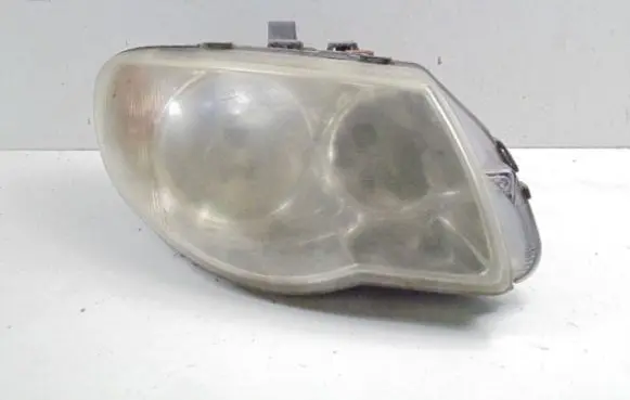Chrysler Grand Voyager IV Headlight/headlamp 04857830AB