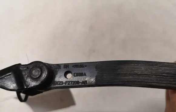 Jaguar XF Rear door check strap stopper