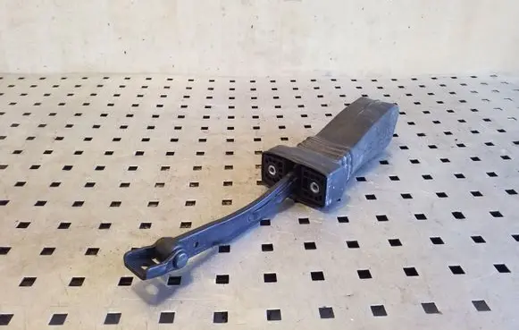 Front door check strap stopper