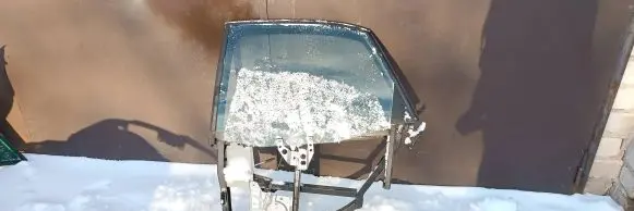 Rear door manual window regulator