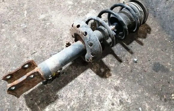Opel Astra G Front shock absorber with coil spring 22195354
