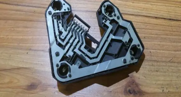 Tail light bulb cover holder