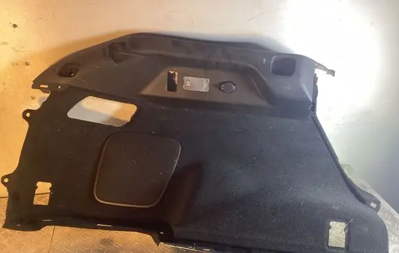 Trunk/boot lower side trim panel
