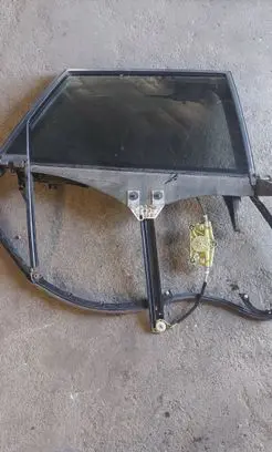 Rear door window regulator with motor