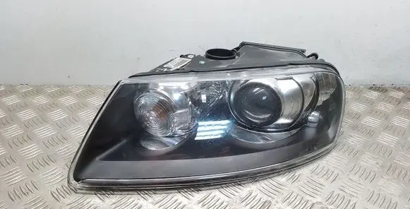 Volkswagen Touareg I Headlight/headlamp 89399395 7L6941015CP 3D0907391B