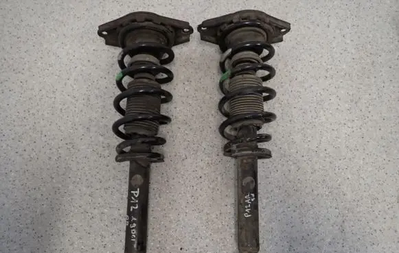 Nissan Primera Front shock absorber with coil spring 