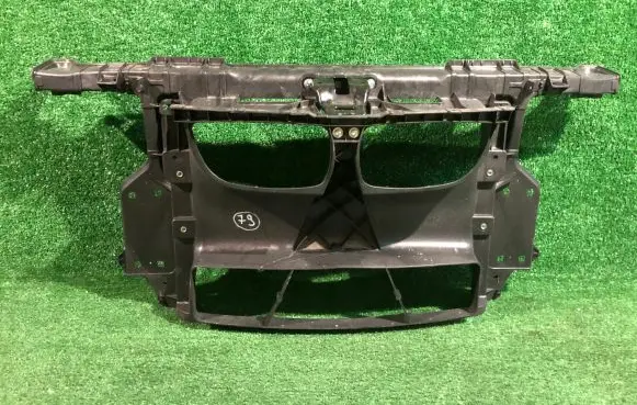 Radiator support slam panel