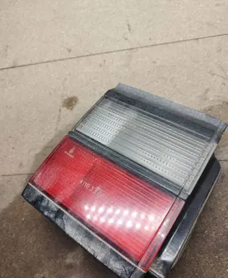 Volkswagen PASSAT B3 Tail light bulb cover holder 321945259