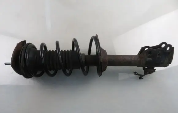 Toyota Yaris Front shock absorber with coil spring