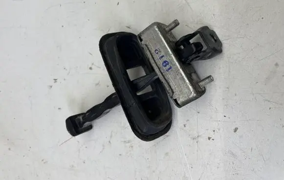 Front door check strap stopper