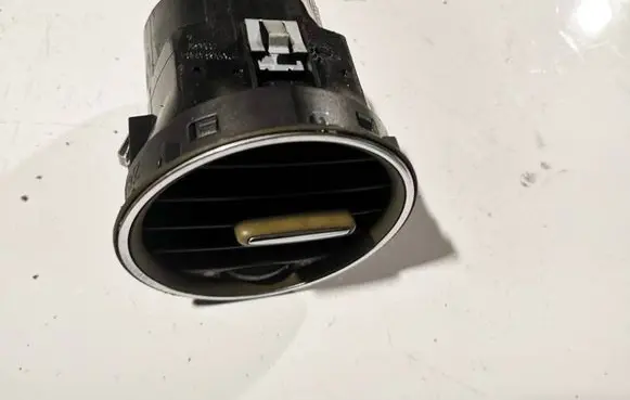 Dash center air vent grill