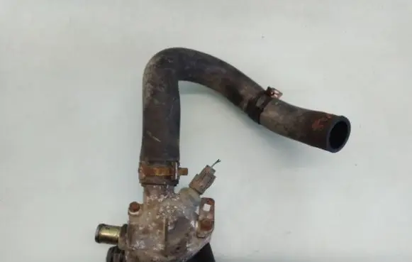 Thermostat/thermostat housing