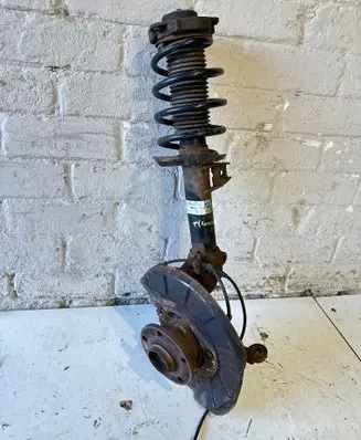 Volkswagen Tiguan Front shock absorber with coil spring