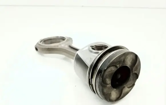 Piston with connecting rod