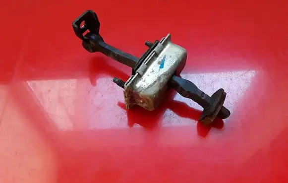 Cadillac SRX Rear door check strap stopper 25773003