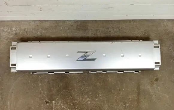 Nissan 350Z Parcel shelf speaker trim grill 93130CD000
