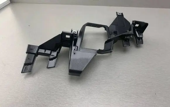 Headlight/headlamp mounting bracket