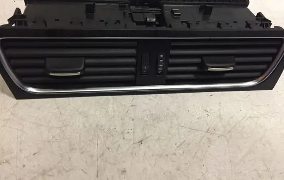 Dash center air vent grill