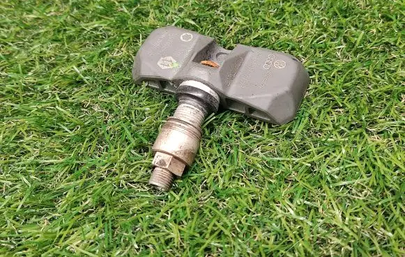 Hyundai Santa Fe Tire pressure sensor 4F0907275B
