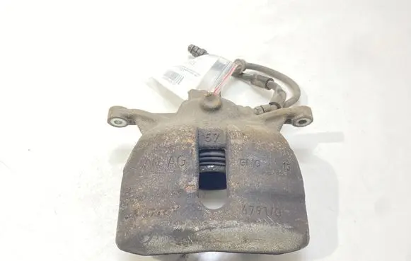 Volkswagen Golf VII Front brake caliper