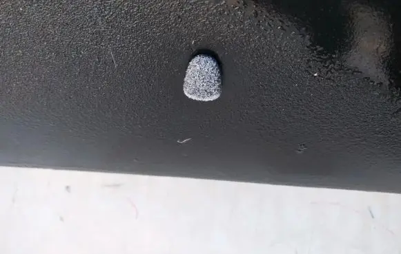 Windshield washer spray nozzle