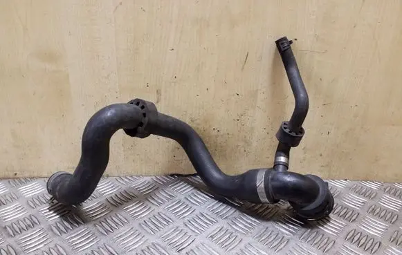 Volkswagen Touareg I Engine coolant pipe/hose 7L6122291E