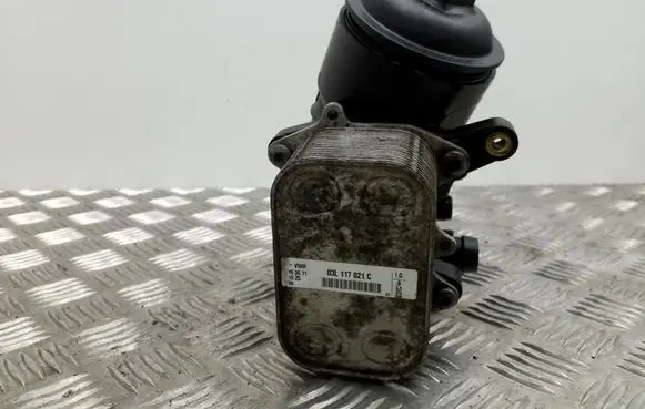 Volkswagen PASSAT B7 Oil filter mounting bracket 03L117021C