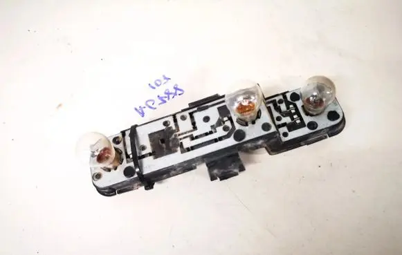Nissan Almera N16 Tail light bulb cover holder 236873