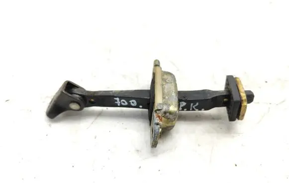 Front door check strap stopper