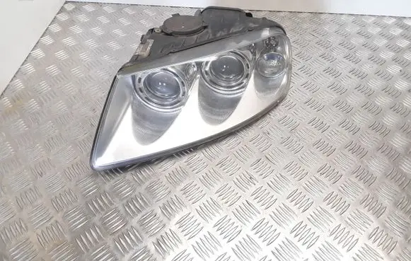 Volkswagen Touareg I Headlight/headlamp 7L6941015 89307851